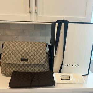Real Authentic Gucci GG Supreme diaper bag with changing pad